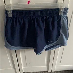 Women’s Light and dark blue Nike athletic Shorts.